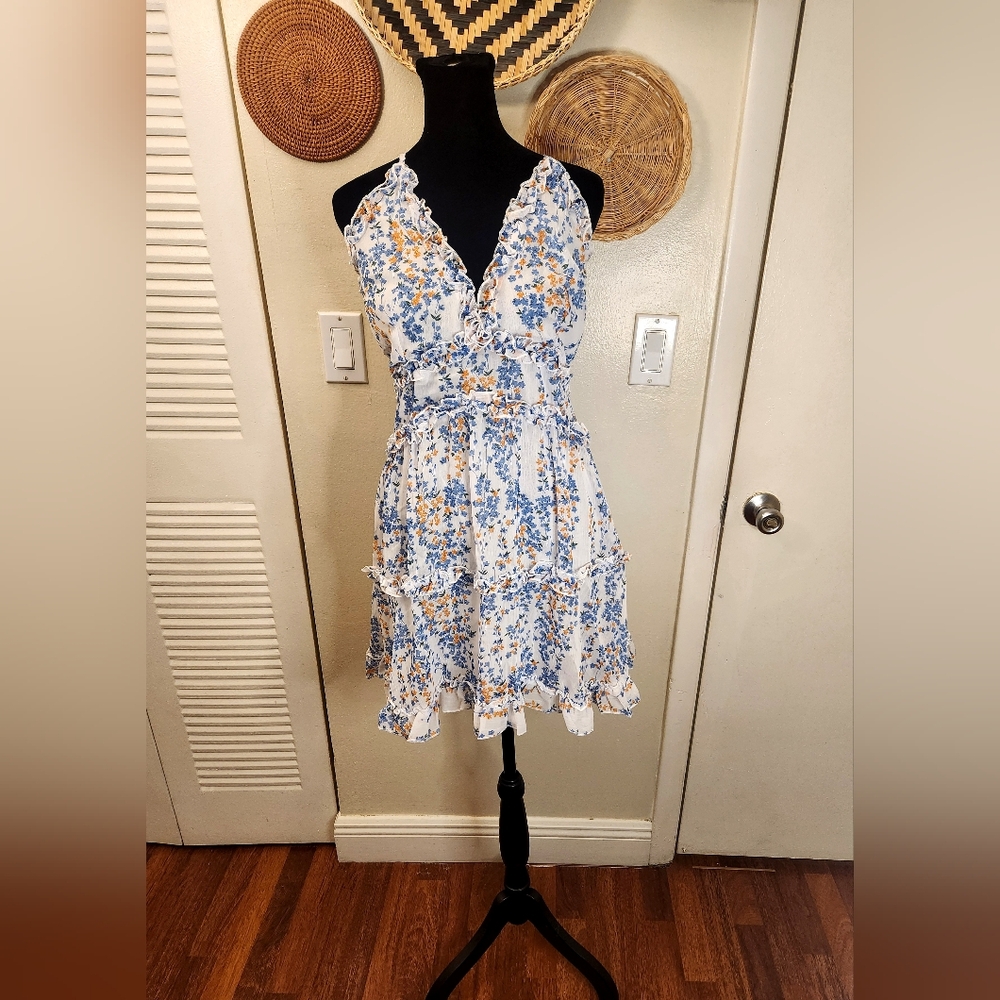LAST ONE! Blue And White Floral Mini Dress With Ruffles And Criss-Cross Back - Picture 7 of 11